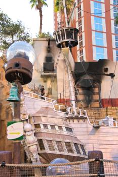 LAS VEGAS, NEVADA, USA - OCTOBER 20 : Pirate ship at pond near Treasure Island hotel on October 20, 2013 in Las Vegas. This Caribbean themed resort has an hotel with 2,884 rooms