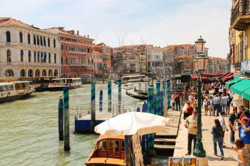 VENICE, ITALY - MAY 06, 2014: Active movement on a canal in sunny spring day,Venice, Italy