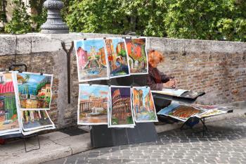 ROME, ITALY - MAY 03, 2014: Street painter at work in Rome, Italy