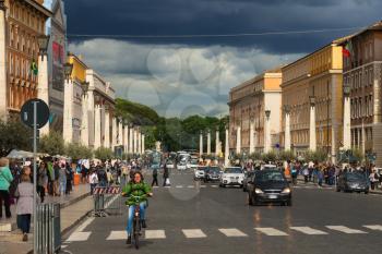 ROME, ITALY - MAY 03, 2014: People on street Via della Conciliazione. Vatican City, Italy