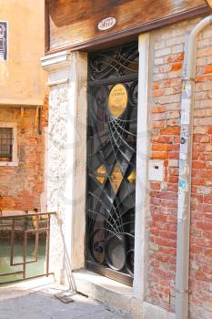 VENICE, ITALY - MAY 06, 2014: Beautiful door to dentist office in Venice, Italy