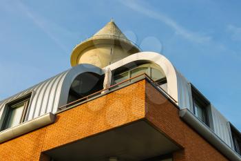 Modern building near the water tower in Meerkerk, Netherlands