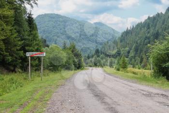 Country road between small settlements in the Carpathians, Ukraine