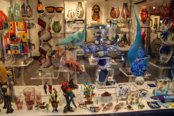 Venice, Italy - August 13, 2016: Traditional Venetian souvenirs in gift gallery in historic city centre