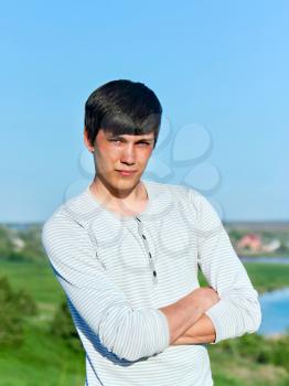 summer portrait of a young man outdoors