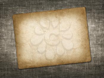Old vintage card on linen grungy background