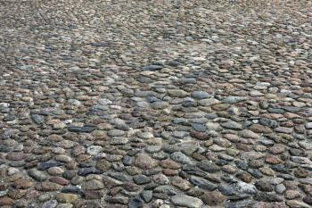 Old cobblestone pavement as a vintage background