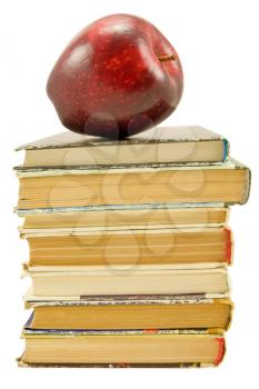 Royalty Free Photo of an Apple on a Stack of Books