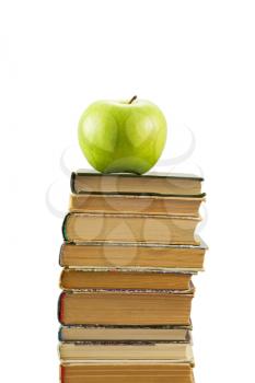 Royalty Free Photo of an Apple on a Stack of Books