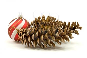 Royalty Free Photo of a Christmas Ornament and Pine Cones