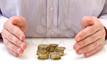 Royalty Free Photo of a Businessman With Coins