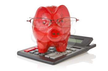 calculator and piggy-bank with glasses  on white background 