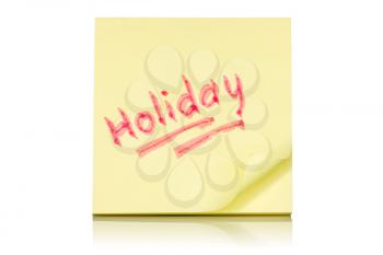  Holiday written on the yellow note. Isolated on white background