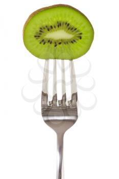 Kiwi on fork, isolated over a white background