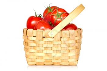 Wicker basket full of tomatoes, isolated on white background 