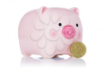 Pink piggy bank and fifty Euro cent isolated on white background
