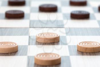 Close-up  photo of the checkers board game