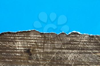 Blue paper and wood - perfect background with copy-space
