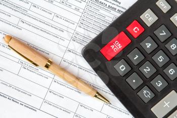 Calculator and form 1042-s which confirms the payment of the tax in the USA