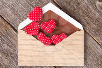 Hearts fly out from the envelope. Love Letter. Background Valentine's day.