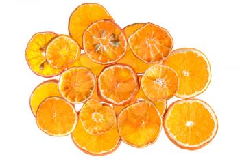 Dried orange slices from above, isolated on white background