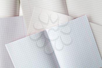 Various exercise books with copy-space. Education concept.