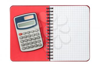  Digital calculator and spiral notebook ,isolated on white background