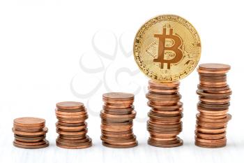 Golden bitcoin on top of coins stack. Cryptocurrency exchange rate concept, risky investment