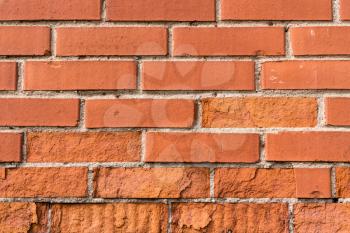 Close up view of of old red brick wall. Can be used as background.
