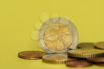 Close up of euro coin, focus on 2 euro