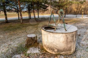 An old well in the countryside, the photo was taken in cold weather. 