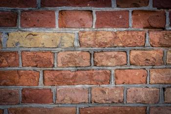 Background of old vintage brick wall. Red brick wall texture grunge background