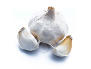 One garlic with two slices on white