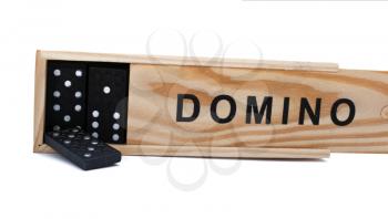 Wooden domino box with black dominos on white