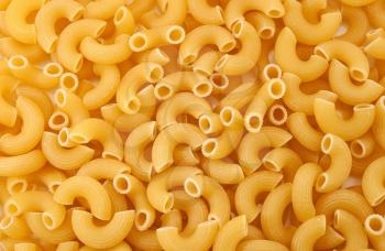 Raw macaroni texture or background
