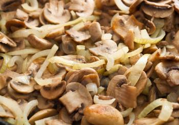 Fried champignons with golden onion