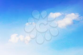 White clouds on blue background