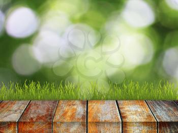 Green grass with wooden pier over summer background