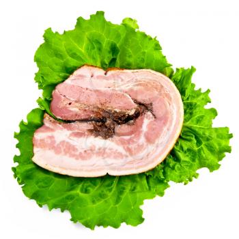 Royalty Free Photo of a Slab of Bacon on Lettuce