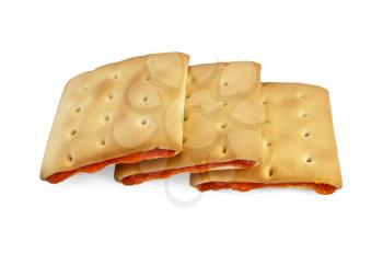 Three whole cracker filled with jam isolated on white background