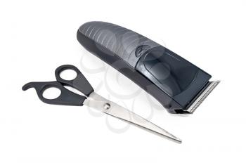 Professional hairdressing tools. Scissors, hair clippers isolated on a white background