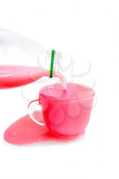 A pink drink made from whey and juice in a plastic bottle, cup and so isolated on a white background