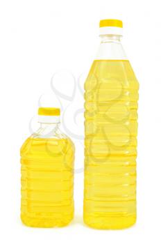 Vegetable oil in two bottles isolated on white background