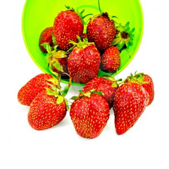 Strawberries in a green plastic cup isolated on white background