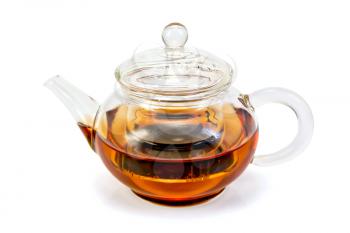 Tea in a glass teapot isolated on a white background