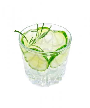 Lemonade with a cucumber and rosemary in a glass isolated on white background