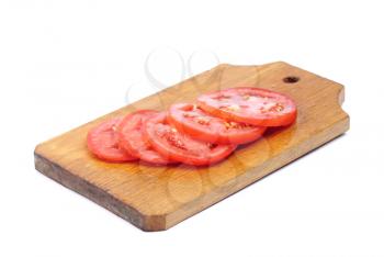 Royalty Free Photo of Sliced Tomatoes on a Cutting Board