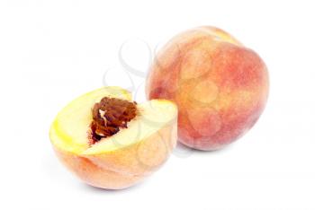 Royalty Free Photo of One Whole Peach and a Half Peach
