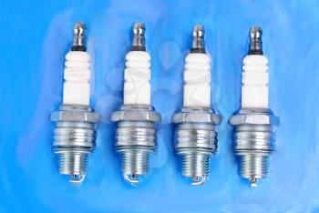 spark-plug on the blue background 