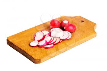 Fresh slised and whole radish on  cutting board  isolated on  white